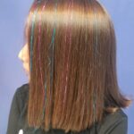 Girl hair with colored streaks